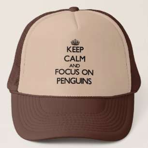 Casquette Gardez le calme et le foyer sur des pingouins