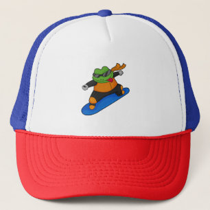 Casquette Grenouille en snowobarder avec snowboard
