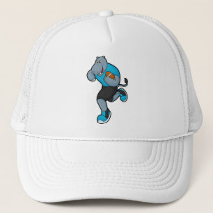 Casquette Hippo comme joueur de football avec football