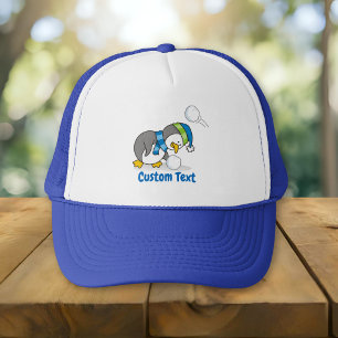 Casquette Little penguin getting a snow ball trucker hat