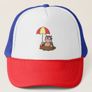 Casquette Mole à la pluie avec parapluie