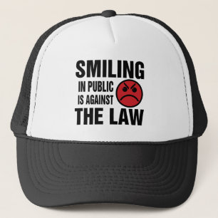Casquette Sourire en public est contre la loi
