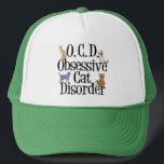 Casquette Trouble de chat obsessionnel<br><div class="desc">J'adore mes chats. J'ai l'OCD,  Obsessive Cat Disorder. Un drôle de casquette de chaton qui ferait un grand cadeau pour quelqu'un qui aime les chatons mignons. Les différentes races de chats rampent sur les lettres de ce joli casquette.</div>
