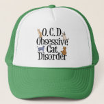 Casquette Trouble de chat obsessionnel<br><div class="desc">J'adore mes chats. J'ai l'OCD,  Obsessive Cat Disorder. Un drôle de casquette de chaton qui ferait un grand cadeau pour quelqu'un qui aime les chatons mignons. Les différentes races de chats rampent sur les lettres de ce joli casquette.</div>