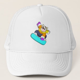 Casquette Vache en snowboard avec snowboard