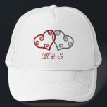 Casquette We just got ENGAGED! mesh-back cap<br><div class="desc">A "we just got engaged!" cap for a happy couple to let everyone know.
 It shows two interlinked hearts,  one in red and one in silver. Change the monogram to their initials.



image code: intwhrts</div>