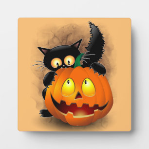 Cat Fun Halloween Character die op een pompoen tik Fotoplaat