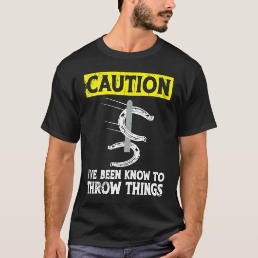 Caution i've been known to throw things horseshoe  t-shirt (Voorkant)