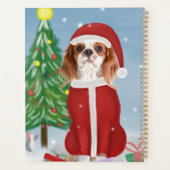 Cavalier King Chien dans la neige avec des cadeaux (Dos)