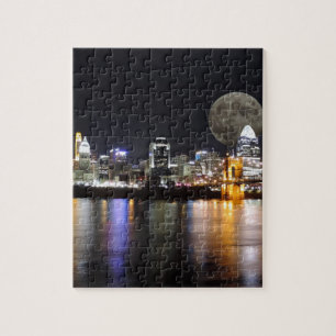 Cburn nat skyline met de maan legpuzzel