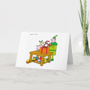 Cerfs communs de houx avec la carte de Noël d'elfe