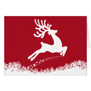 Cerfs communs sautants avec la carte de voeux