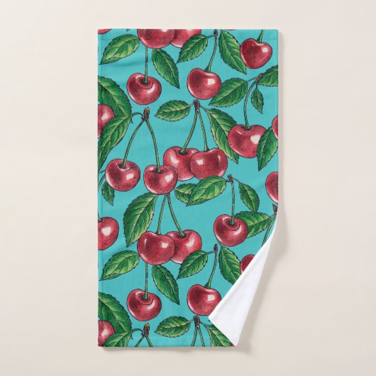 Cerises rouges sur turquoise (Serviette à main)