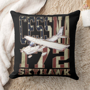 Cessna 172 Skyhawk met vintage vlag van de Verenig Kussen