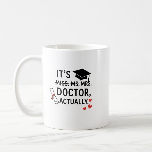 C'est Docteur en fait Graduation Mug (Gauche)