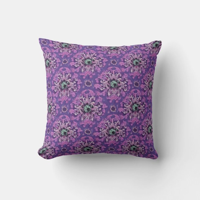 C'est un coussin avec un motif floral brillant sur (Recto)