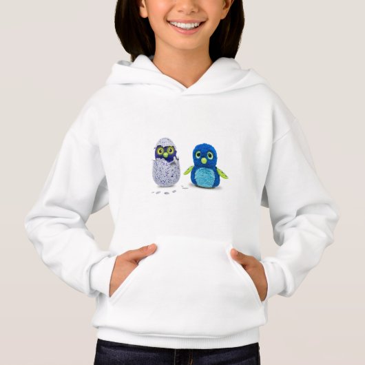 c'est un grand T-shirt pour hatchimals jouet iso (Devant)