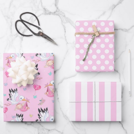 C'est un papier cadeau bébé fille cigogne (Recto)
