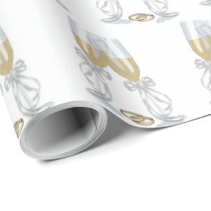 Champagne-fluiten met trouwringen cadeaupapier