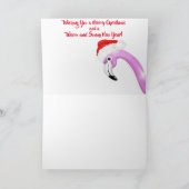 Chapeau de Santa sur une carte de vacances flottan (Intérieur)