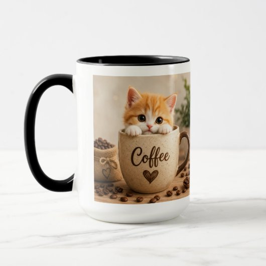 Charme de chaton dans une tasse de café (Gauche)