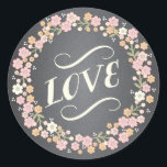 Charming Garden Floral Wreath Mariage Love Sticker<br><div class="desc">Ce joli design de couronne de fleurs en rose tendre, abricot et ivoire encercle le design de typographie "Love" charmant sur cet autocollant de faveur de mariage mis sur un arrière - plan populaire de tableau noir. Élégant mais décontracté, il est un accessoire parfait pour tout mariage de printemps ou...</div>