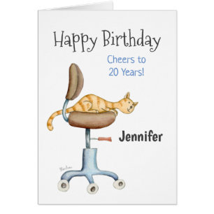 Chat assis sur une chaise