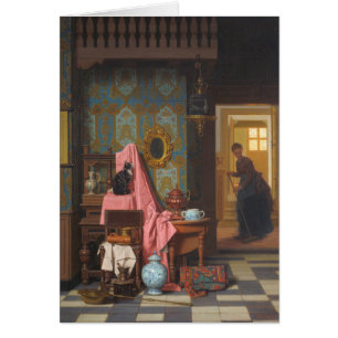 Chat avec une cage à oiseaux