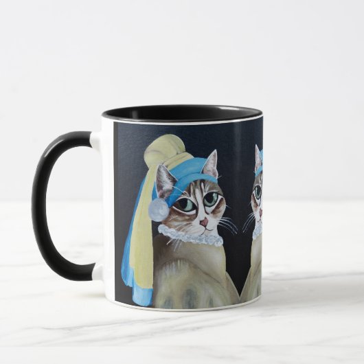 Chat Avec Une Perle De Mug (Gauche)