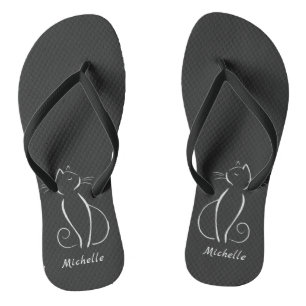 Chat blanc minimaliste sur des tongs noires Ajoute