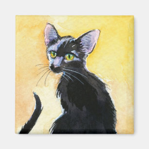 Chat chaton noir, aimant orange et jaune