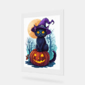Chat de cuisine d'Halloween sur un Citrouille (Angle)
