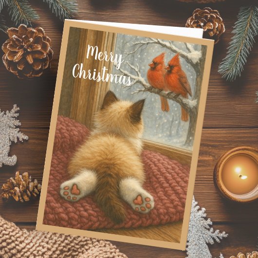 Chat de Noël mignon et carte de vacances cardinale