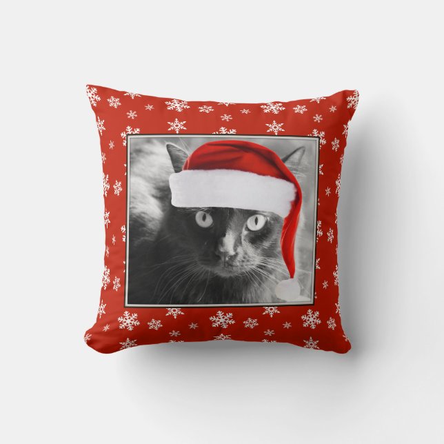 Chat de Noël sur le coussin rouge avec des flocons (Recto)