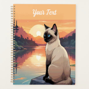 Chat de Siamese par le lac