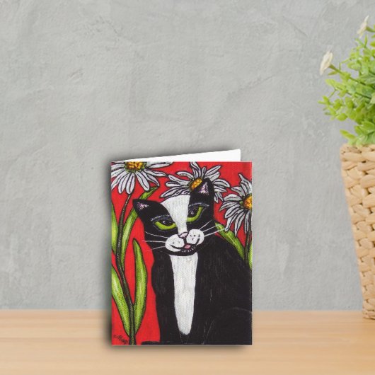 Chat de smoking dans le carte pour notes de