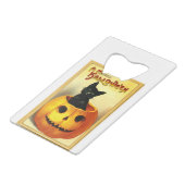 Chat d'Halloween assis dans une citrouille Jack O (Dos Angle)