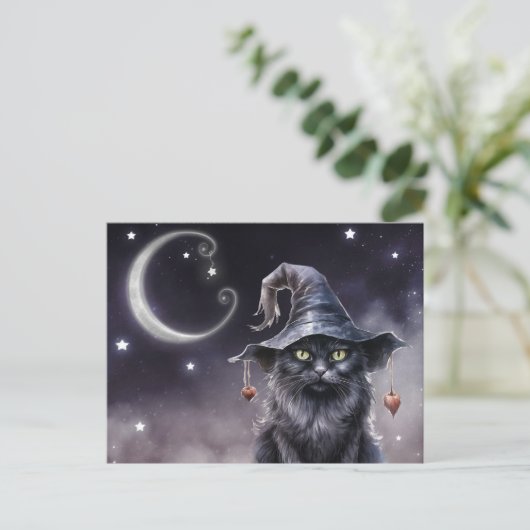 Chat d'Halloween noir portant une carte postale Ca (Debout devant)