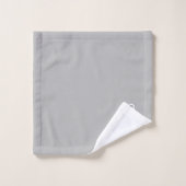 Chat en posture vers le bas sur serviette de bain  (Gant de toilette)