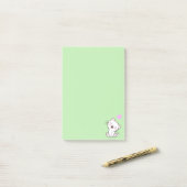 Chat mignon et cœur sur des Post-it vert clair (Sur un bureau)