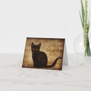 Chat noir avec le carte pour notes de papillon
