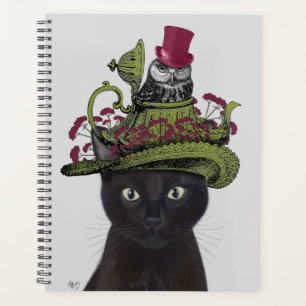 Chat noir avec théière et hibou