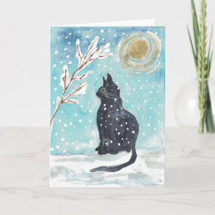 Chat noir dans la neige - carte de vacances