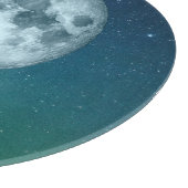 Chat noir dans la planche à découper en clair de l (Coin)