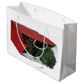 Chat noir dans Noël de sac de cadeau (Dos Angle)