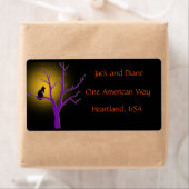 Chat noir dans un Étiquette d'arbre (En situation)