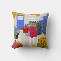 Chat noir et oreiller de jardin de fleurs