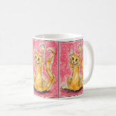 Chat orange triple sur la tasse à pois rose (Devant droit)
