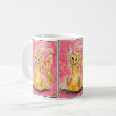 Chat orange triple sur la tasse à pois rose (Devant gauche)