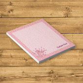 Chat rose avec bloc-notes de violon